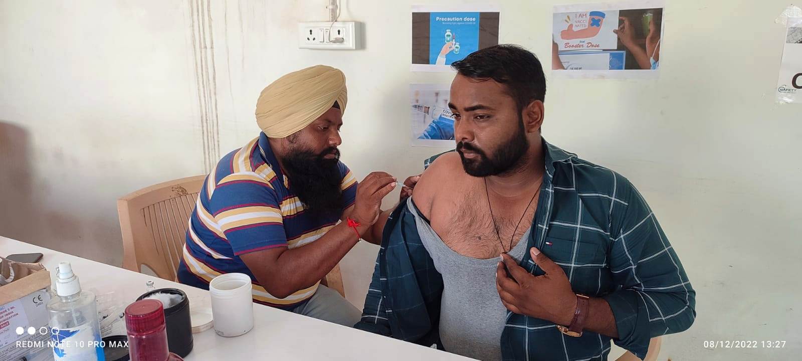 Doctor vaccination at site camp